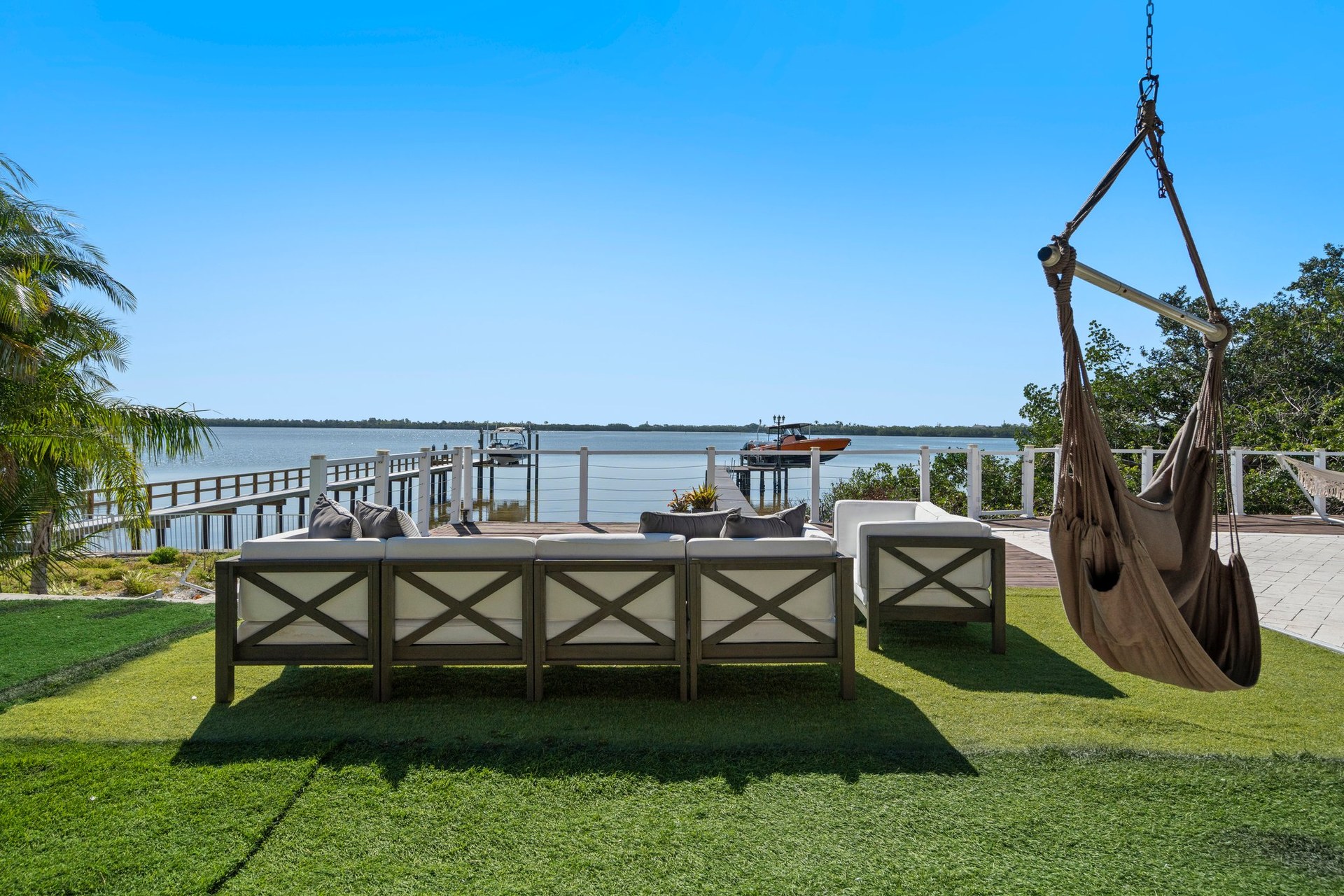 Private waterfront dock at St Pete Waterfront Mansion for kayak launching and boating