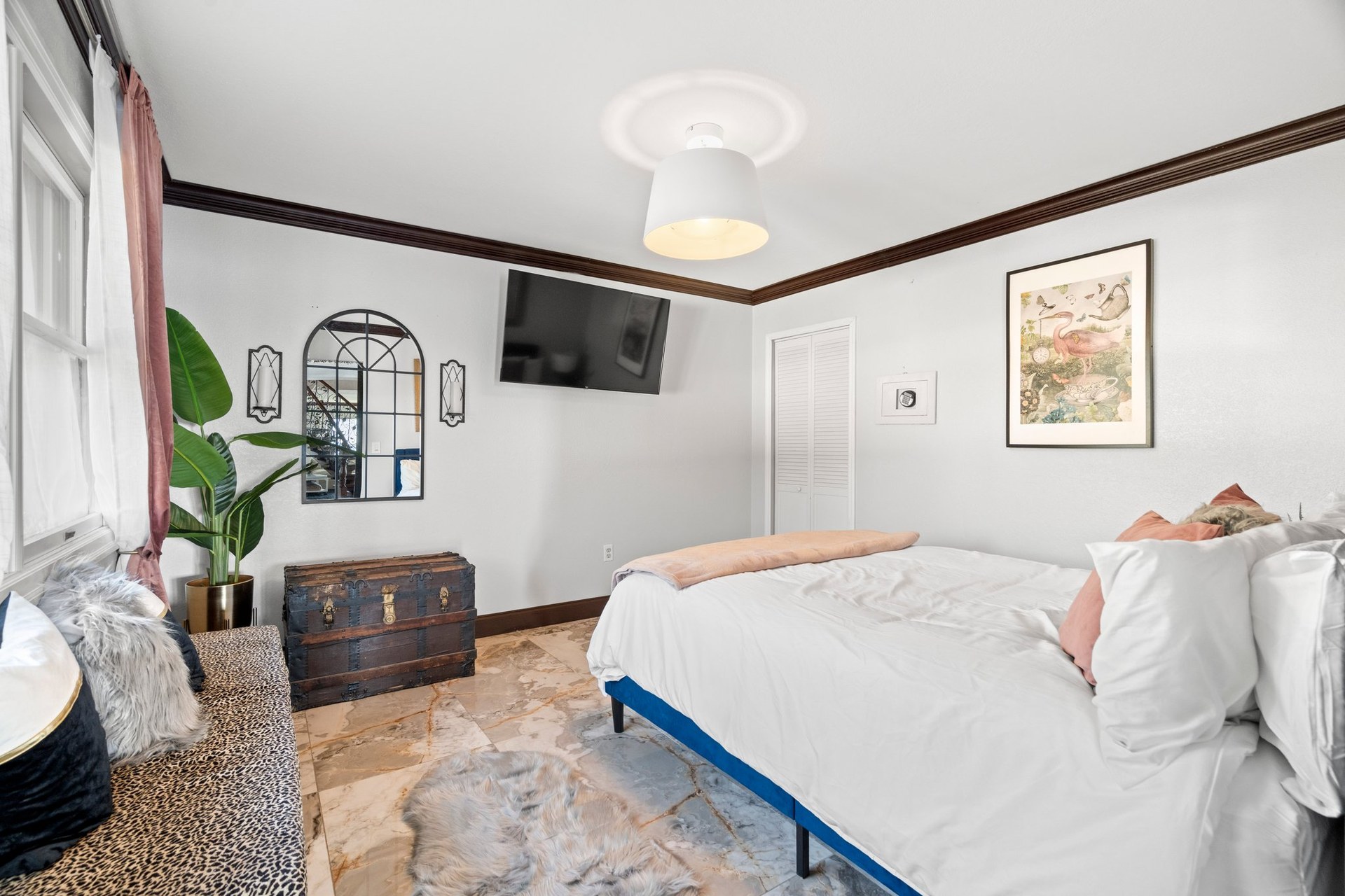 Furnished bedroom suite at St Pete Waterfront Mansion